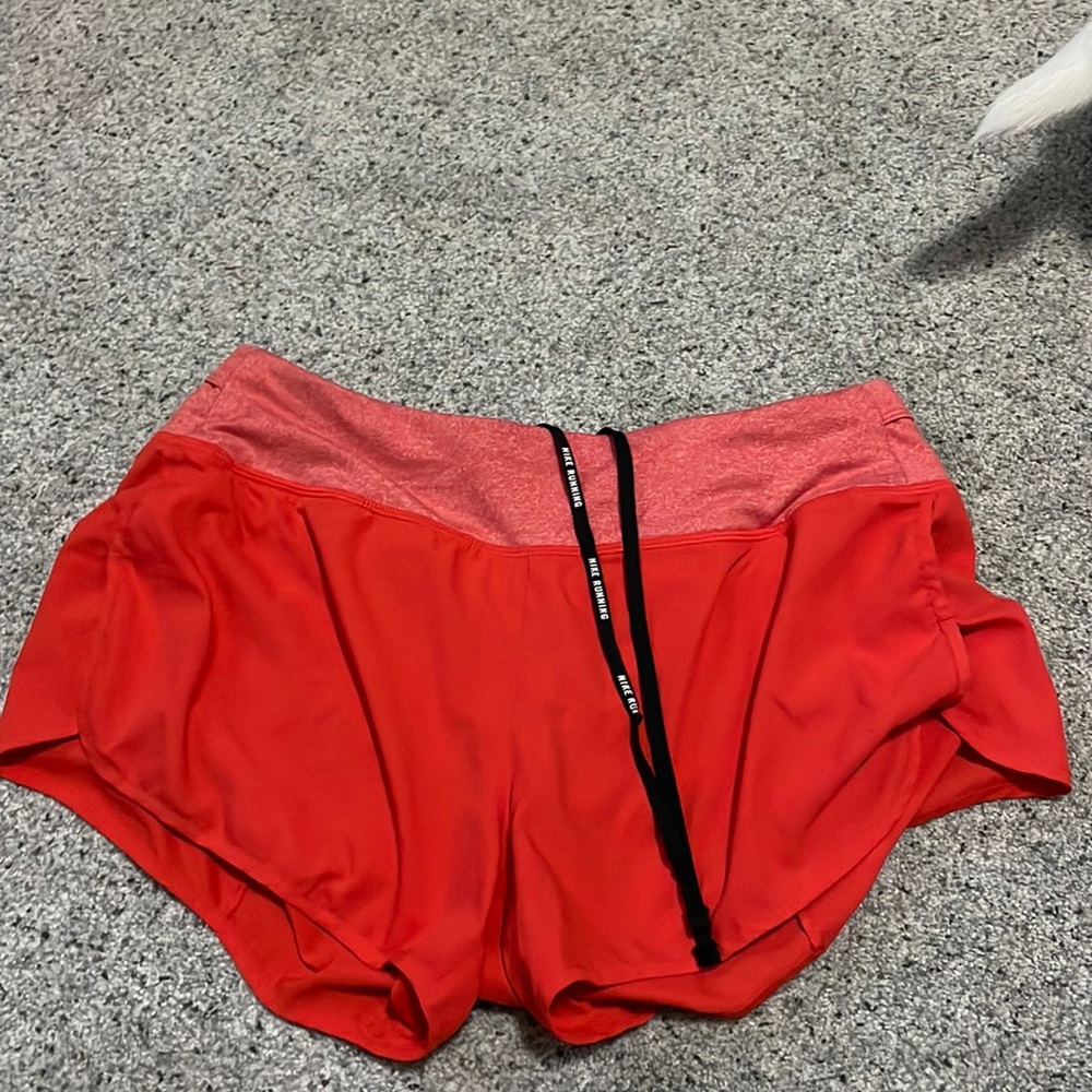 Dri-Fit running shorts with secret pocket in the back. Size: M and barely worn.